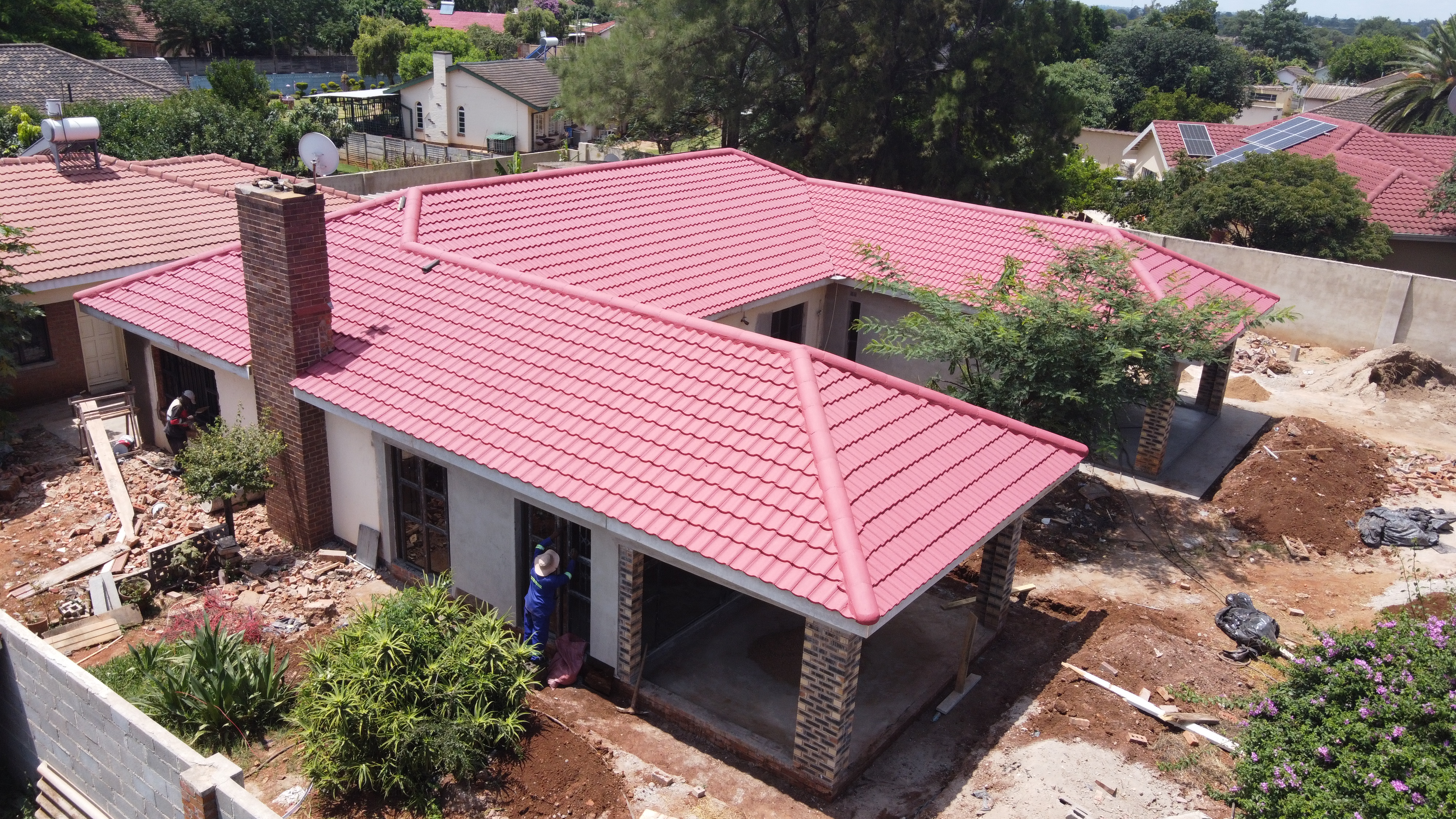 The King of Tiles: Why Double Roman is Zimbabwe’s Gold Standard for Roofing.